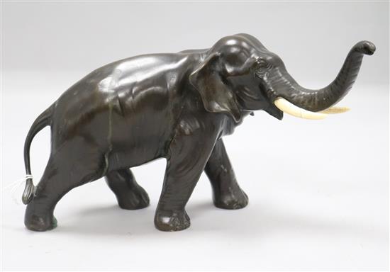 A Japanese bronze elephant, Meiji period, signed